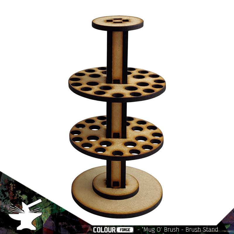 The "Mug o Brush" paint brush stand from The Colour Forge is a great addition to any work bench. Designed to save space and protect your brushes from damage.This kit is made of 3mm MDF which is quick and simple to assemble without compromising on quality. The stand when assembled will fit inside a typical mug to prevent any chance of knocking it over.This kit requires assembly.*mug and brushes not included The Colour Forge    Mug o' Brush - Paint Brush Stand - TCF-ACC-002 - 5060843100591