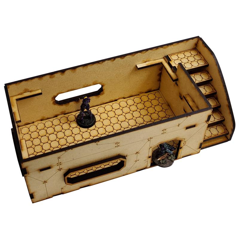 This Sci-Fi Hab Block Charlie kit is the perfect addition to any 25-32mm sci-fi table!Dimensions: (Width:238mm) (Depth: 103mm) (Height: 82mm)This quick and easy to assemble kit is made from 3mm mdf and is cut with precision to ensure minimal effort removing it from the sprue.The door contains 2 holes for magnets, these measure 2mm wide by 3mm deep, there is a similar hole on the door frame. The roof is completely removable for access during gaming and modelling.This kit requires assembly. The Colour Forge Sci-Fi Hab Block Charlie - TCF-SCI-003 - 5060843100539