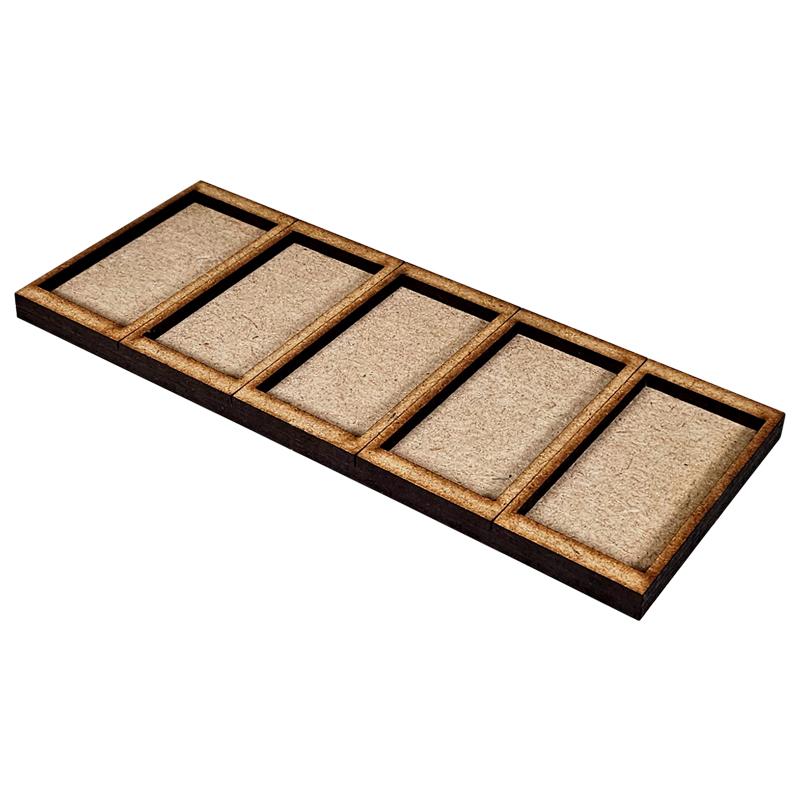 Converter Movement Tray 25x50mm to 30x60mm (5x1)The perfect way to save you form having to rebase those classic miniatures, these movement trays allow you to use 25x50mm Based miniatures with the spacing of 30x60mm. Each tray is made from 3mm thick MDF parts which can be easily stuck together with white glue. The Colour Forge Converter Movement Tray 25x50mm to 30x60mm (5x1) - TCF-ACC-039 - 5060843103776