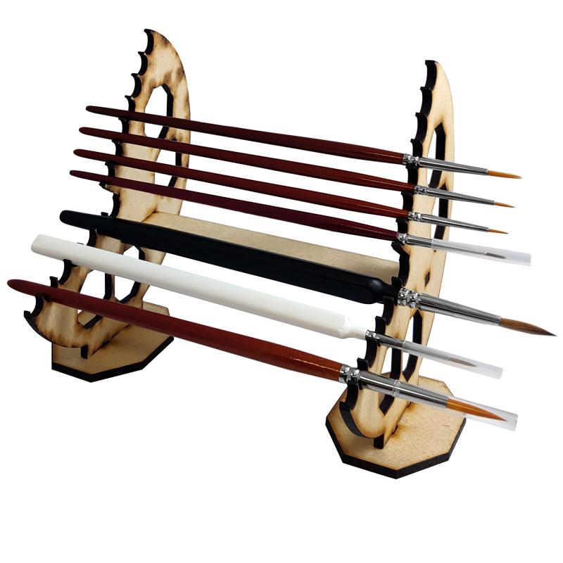 The "Brush of Choice" paint brush stand from The Colour Forge is a perfect aid to your work bench. Designed to hold your paint brushes safely, prevent damage and allow for easy selection during your hobby timeMade of 3mm MDF this kit is easy to build, sturdy and great value for money.This kit requires assembly.Dimensions (mm): W 160, H 130, D 120*Brushes are not included and shown to demonstrate the use of the stand. The Colour Forge Brush of Choice - Paint Brush Stand - TCF-ACC-001 - 5060843100584
