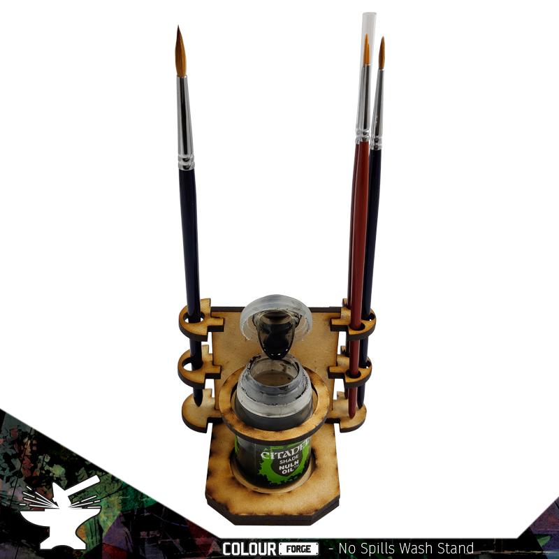 Can you name ANYTHING worse than spilling a brand new pot of Nuln Oil? We didn't think so.Let that be a thing of the past with our No Spills pot and brush holder.This gadget will save you time and money when painting by reducing the amount of time you spend mopping up puddles of liquid gold.PLUS it comes with handy brush holders that clip onto the side so your wash brushes are never far away!Precision cut from 3mm MDF. This kit is supplied unassembled.Pleae note, brushes and paint are not included. The Colour Forge No Spills - Paint Pot Holder - TCF-ACC-006 - 5060843100638