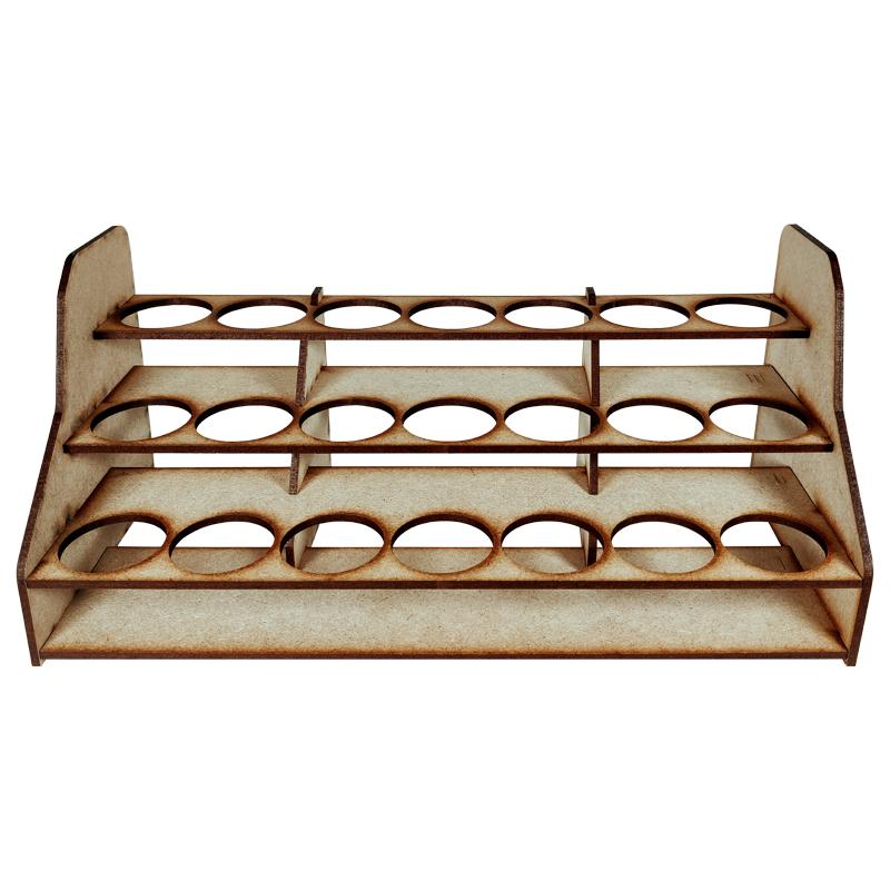 These compact paint racks are a must have for any hobbyist. Designed to sit comfortably on desks of any size they are perfect for keeping your workspace clean and tidy without encroaching on space!This rack holds up to 21 Citadel paint pots.This rack measures 280mm wide, 110mm deep and 125mm high.This product is cut from 3mm MDF and requires assembly.Brushes and paints sold separately and shown for illustrative purposes. The Colour Forge Compact Paint Rack (Citadel Sized Pots) - TCF-ACC-005 - 5060843100607