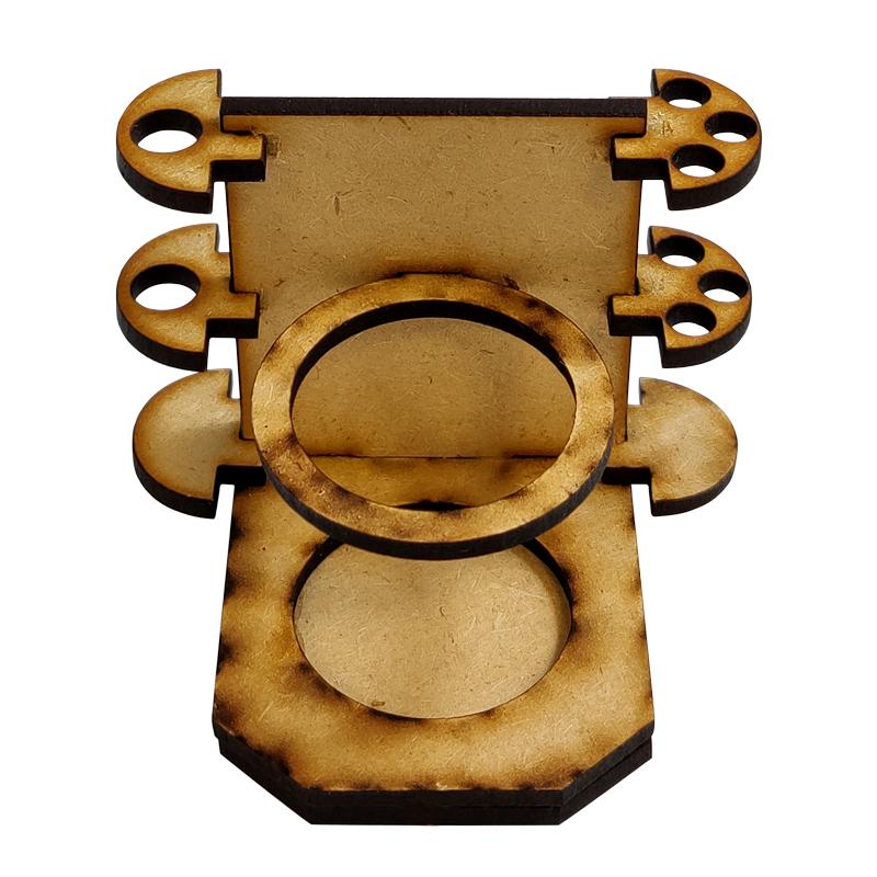 Can you name ANYTHING worse than spilling a brand new pot of Nuln Oil? We didn't think so.Let that be a thing of the past with our No Spills pot and brush holder.This gadget will save you time and money when painting by reducing the amount of time you spend mopping up puddles of liquid gold.PLUS it comes with handy brush holders that clip onto the side so your wash brushes are never far away!Precision cut from 3mm MDF. This kit is supplied unassembled.Pleae note, brushes and paint are not included. The Colour Forge No Spills - Paint Pot Holder - TCF-ACC-006 - 5060843100638