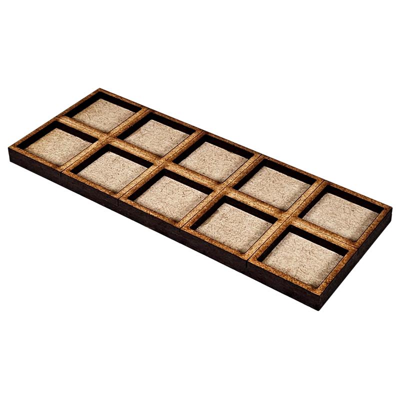 Converter Movement Tray: 20mm to 25mm (5x2)The perfect way to save you form having to rebase those classic miniatures, these movement trays allow you to use 20mm Based miniatures with the spacing of 25mm. Each tray is made from 3mm thick MDF parts which can be easily stuck together with white glue. The Colour Forge Converter Movement Tray: 20mm to 25mm (5x2) - TCF-ACC-036 - 5060843103745