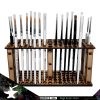 The Mega Brush Stand can hold up to 78 brushes.The diameter and quantity of the holes is as follows:50x 8mm20x 9mm8x 10mmThis product is made of 3mm MDF and is supplied unassembled. We recommend The Colour Forge Basing Glue to assemble it.Brushes not included. The Colour Forge Mega Brush Stand - TCF-ACC-010 - 5060843101888