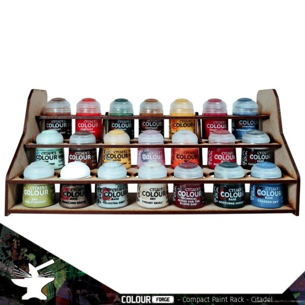 These compact paint racks are a must have for any hobbyist. Designed to sit comfortably on desks of any size they are perfect for keeping your workspace clean and tidy without encroaching on space!This rack holds up to 21 Citadel paint pots.This rack measures 280mm wide, 110mm deep and 125mm high.This product is cut from 3mm MDF and requires assembly.Brushes and paints sold separately and shown for illustrative purposes. The Colour Forge Compact Paint Rack (Citadel Sized Pots) - TCF-ACC-005 - 5060843100607